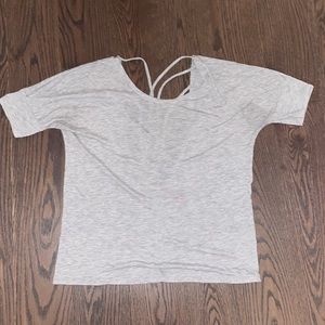 La Senza loose fitting top, mostly open back with stringy design.